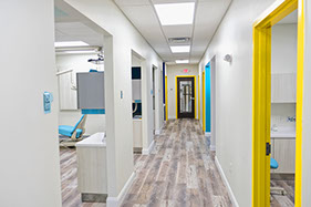 colorful hallway leading to treatment rooms and the exit